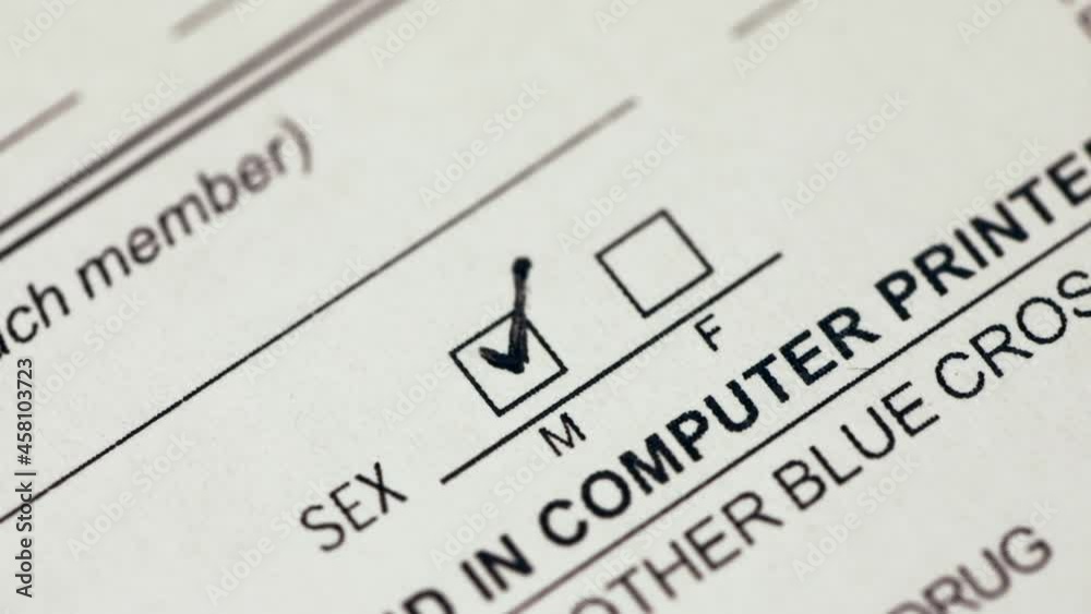 Person marking gender checkbox in a form Person marking gender checkbox in a form