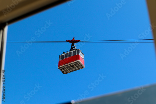 Wallpaper Mural old vintage red cable car cabin in the bright blue sky Torontodigital.ca