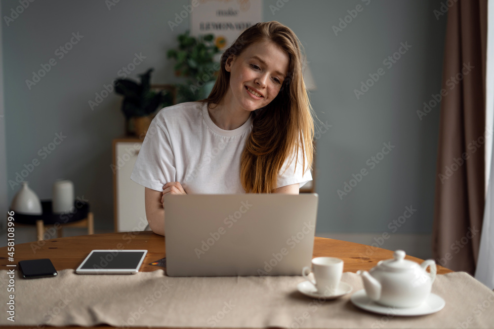 The student does his lessons remotely on a laptop. A freelancer works online at home in the workplace. Housewife surfing the internet. Fills out an application to the bank for a loan. The student does his lessons remotely on a laptop. A freelancer works online at home in the workplace. Housewife surfing the internet. Fills out an application to the bank for a loan.