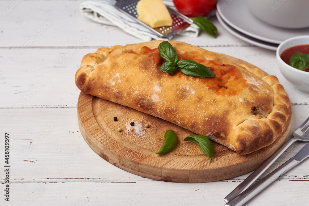 traditional closed italian pizza calzone