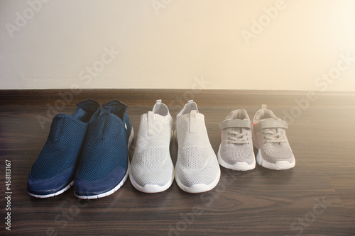 Men's, women's and children's pair of shoes. The concept of a healthy lifestyle