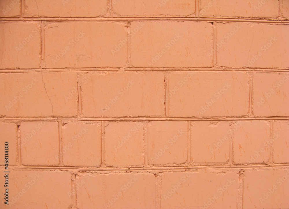 Obraz premium Brick wall. Background. The brick is painted orange.