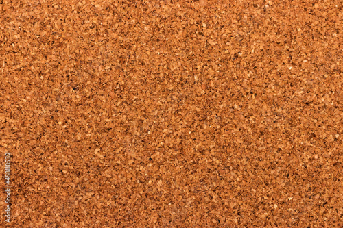 Empty bulletin board background, brown textured cork board backdrop for office note, memo, or post-it