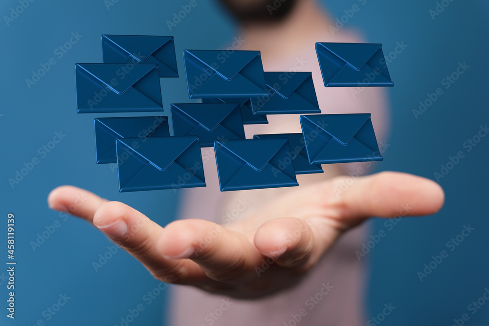 Hand holding using mobile phone with email icon on screen. Concept of business communication Hand holding using mobile phone with email icon on screen. Concept of business communication