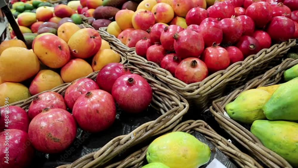 shop counter with fresh fruits fresh fruits in supermarket green yellow and red