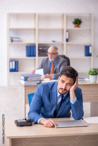 Two colleagues working in the office