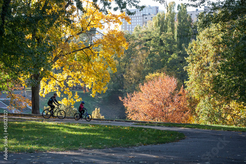 Autumnal people walking in the park