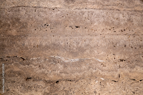 the texture of a stone wall with cracks