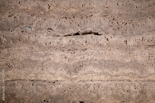 the texture of a stone wall with cracks