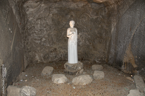 PRAID, ROMANIA -July, 2020 The underground salt mine Salina Praid,  Europe,the statue of a woman in the Praid salt mine photo