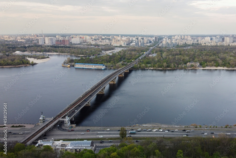 View of the road in the green city - Kiev. The photo shows the bridge View of the road in the green city - Kiev. The photo shows the bridge