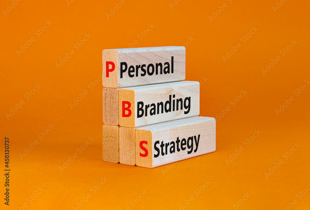 Naklejka premium PBS, Personal branding strategy symbol. Concept words PBS, Personal branding strategy on wooden blocks on a beautiful orange background. Business, PBS, Personal branding strategy concept. Copy space.