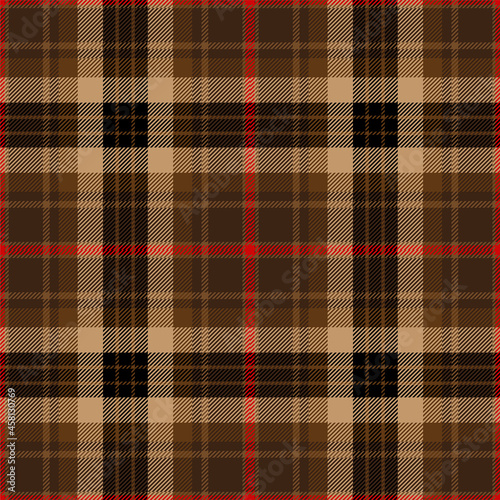 Brown, black and red tartan plaid. Scottish pattern fabric swatch close-up. 