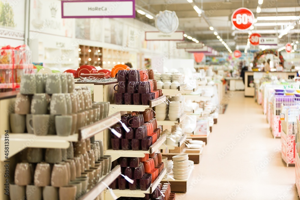 supermarket interior with collection of ceramic and tableware - obrazy, fototapety, plakaty 