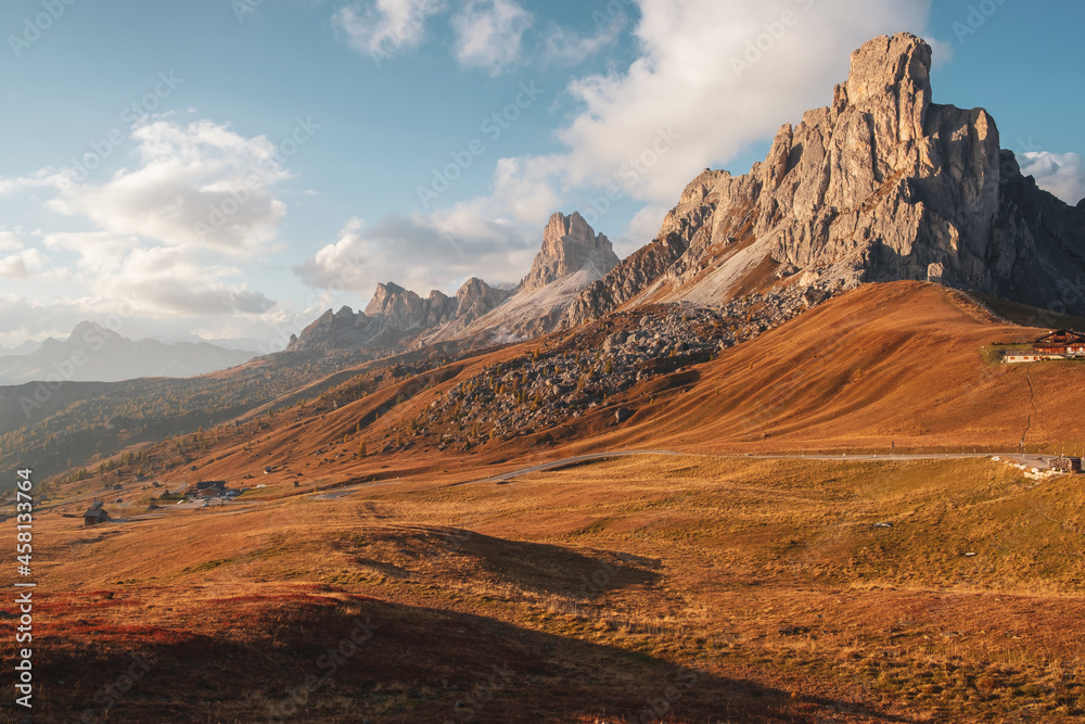 Fototapeta premium Famous Passo di Giau, Monte Gusela at behind Nuvolau gruppe the Dolomites mountains, near the famous Cortina d’Ampezzo city at sunset in South Tyrol