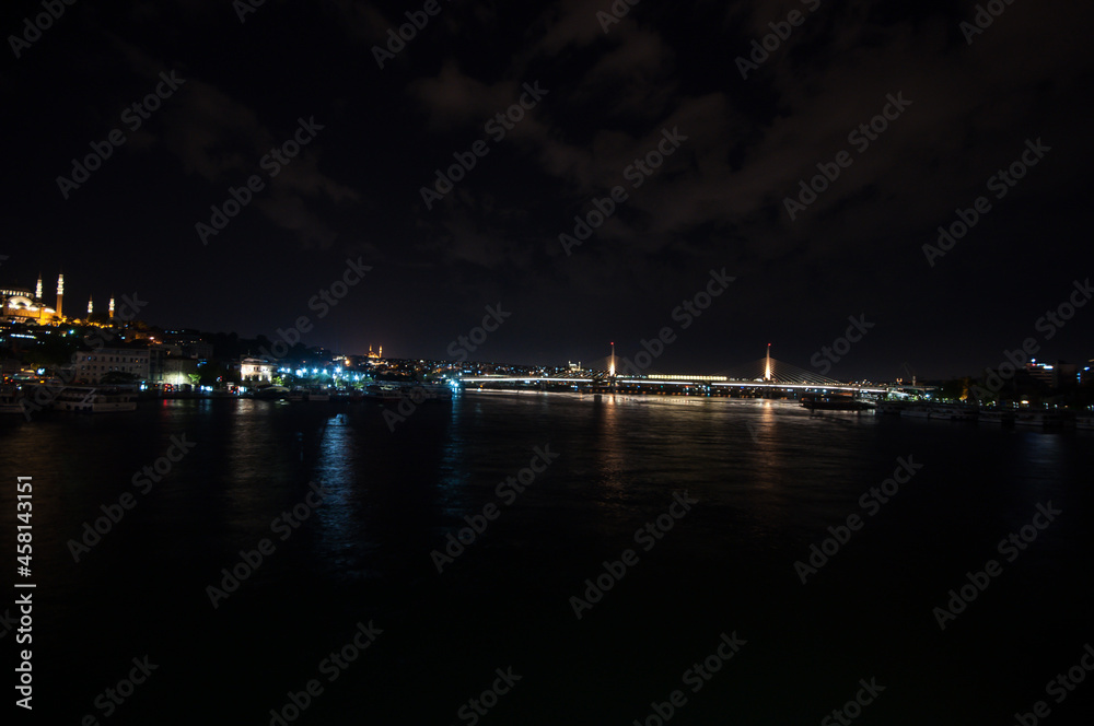 Night lights on Hagia Sophia under a full moon at twilight in Istanbul Turkey