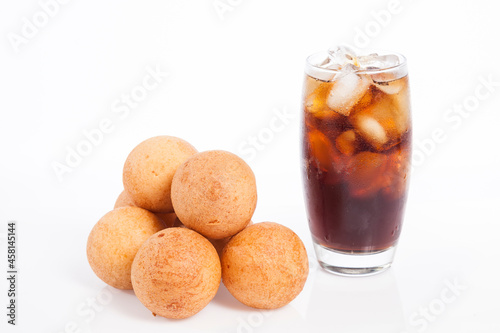Tasty Bunuelos With Soda Drink; Photo on White Background photo