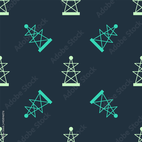 Green and beige Electric tower used to support an overhead power line icon isolated seamless pattern on blue background. High voltage power pole line. Vector