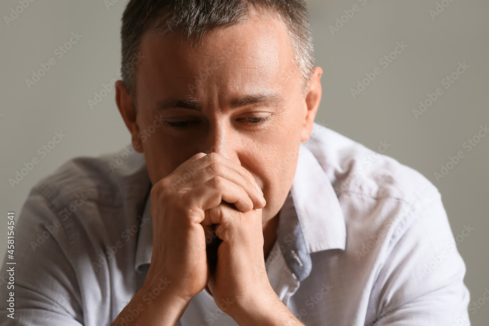 Depressed mature man at home