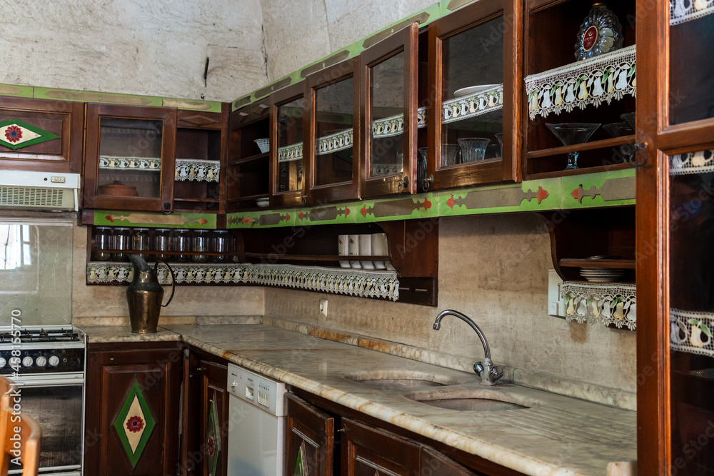 Asmali mansion, An old traditional Turkish cuisine. Kitchen with wooden cabinets and shelves