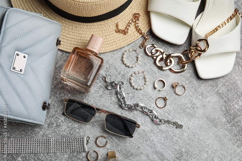 Set of female accessories, shoes and bottle of perfume on grunge  background, closeup Stock-Foto | Adobe Stock