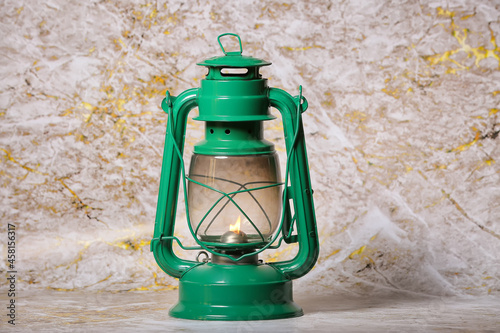 Stylish retro lamp on color...