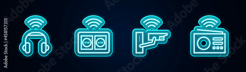 Set line Smart headphones, electrical outlet, security camera and radio. Glowing neon icon. Vector