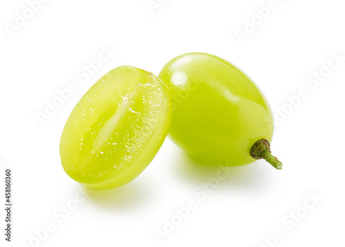 Grains of shine muscat grapes and cut shine muscat grapes on a white background.