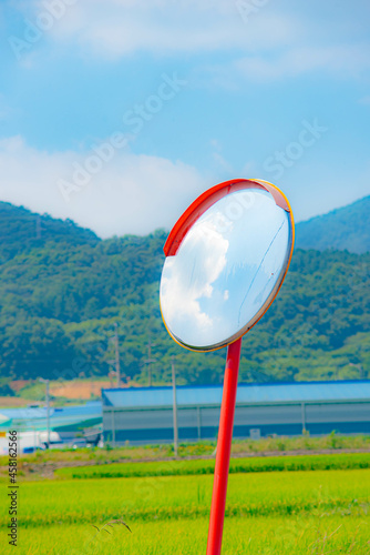 sky reflected in a convex mirror 