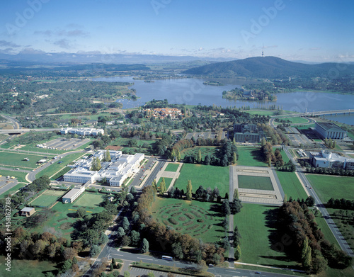 Aerial view of the city of Canberra showing the old Parliament house and Lake Burley Griffin...