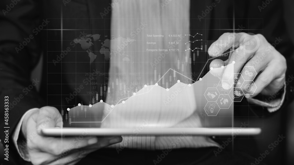 Businessman interaction with artificial intelligence to invest bitcoin price digital chart exchange. Concept of cryptocurrency and nft of blockchain technology on stock market. Black and white tone. Businessman interaction with artificial intelligence to invest bitcoin price digital chart exchange. Concept of cryptocurrency and nft of blockchain technology on stock market. Black and white tone.