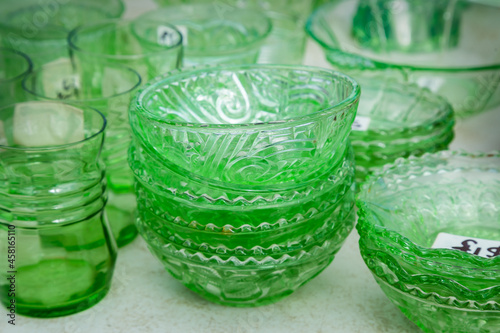 A collection of green glass crockery photo