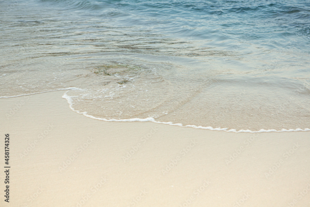 Beautiful beach with very clean and azure water on the mediterranean sea in the island of Ibiza, Spain Beautiful beach with very clean and azure water on the mediterranean sea in the island of Ibiza, Spain