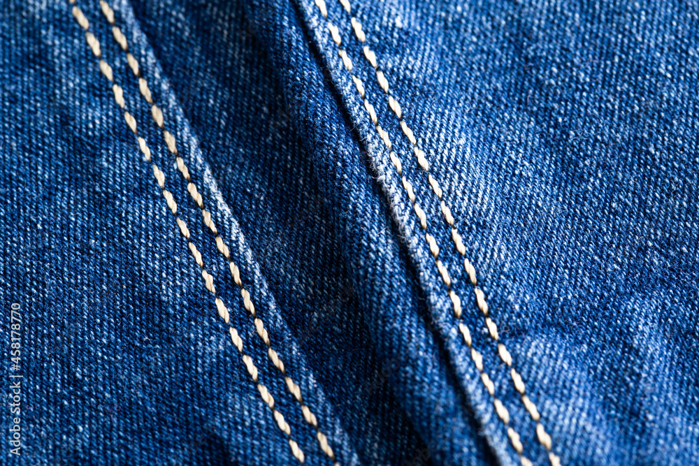 Blue denim, background. Stylish jeans, macro, design Blue denim, background. Stylish jeans, macro, design