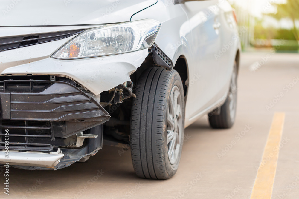 Front of the car get damaged by accident on the road, Car crash accident on street, damaged automobiles after collision