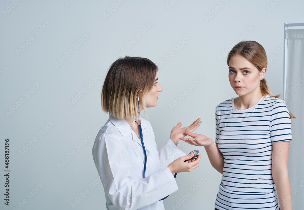 doctor in white coat examination of the patient specialist cardiologist doctor in white coat examination of the patient specialist cardiologist
