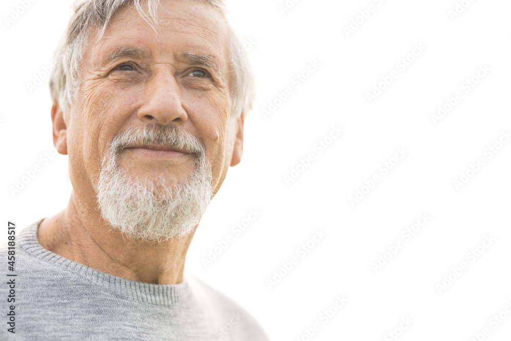 Portrait of a handsome senior man outdoors, against the sky - with ample copy space Portrait of a handsome senior man outdoors, against the sky - with ample copy space