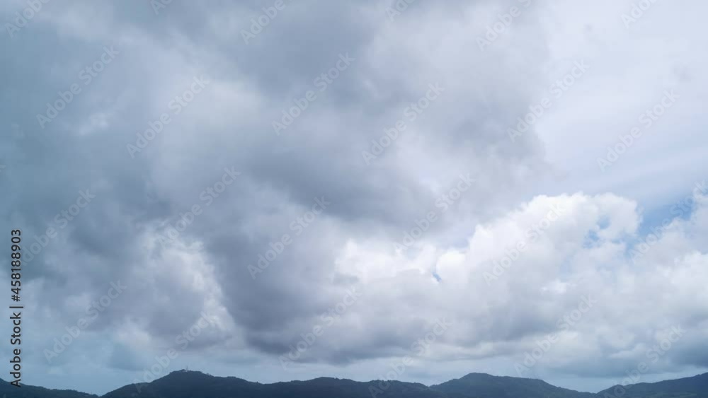 Sky white clouds flowing fast in the sky over sea mountain Cloudscape in Summer Good weather day Cloud time lapse Sky white clouds flowing fast in the sky over sea mountain Cloudscape in Summer Good weather day Cloud time lapse