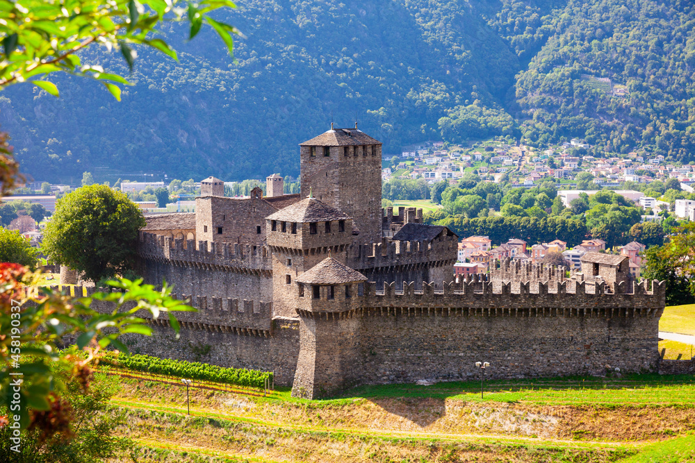 Picturesque summer view of medieval fortified Montebello Castle protecting old city of Bellinzona on foothills of Swiss Alps