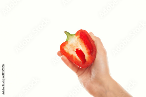 woman holding red pepper in her hands cooking vegetables kitchen ingredient