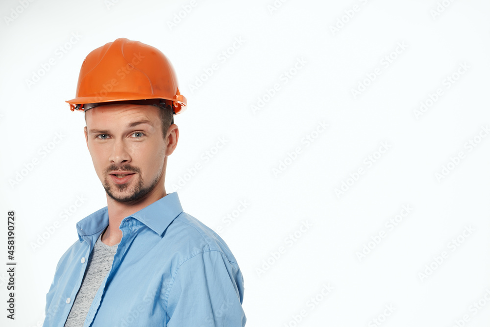 man in orange helmet protection isolated background man in orange helmet protection isolated background
