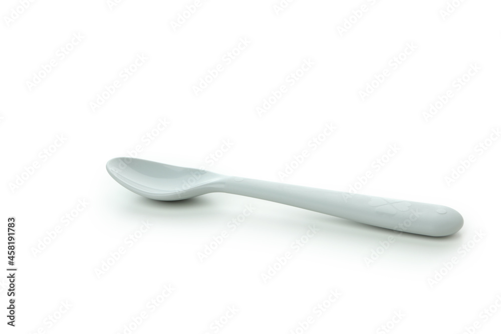 Single plastic spoon isolated on white background