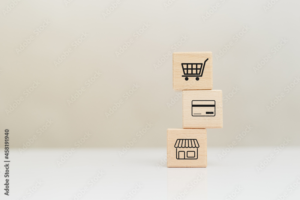 business shopping online concept, wooden cubes block with shopping icons, e-business purchase marketing consumer.