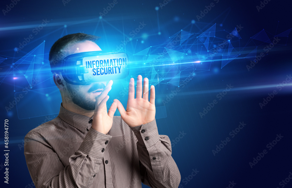Businessman looking through Virtual Reality glasses, virtual security concept Businessman looking through Virtual Reality glasses, virtual security concept