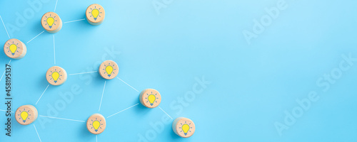 Photos Wooden cubes with lightbulb icon, Creative idea network, Innovation and solution