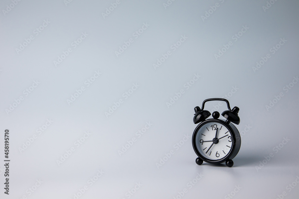 Clock on a white background. With copy space, design for vintage and business.