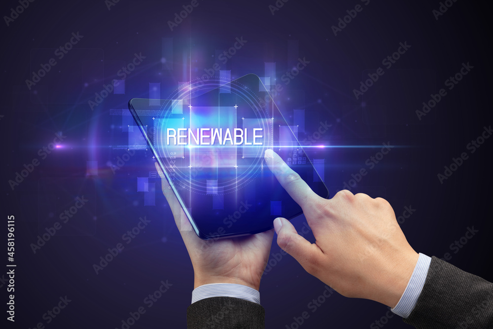 Businessman holding a foldable smartphone Businessman holding a foldable smartphone