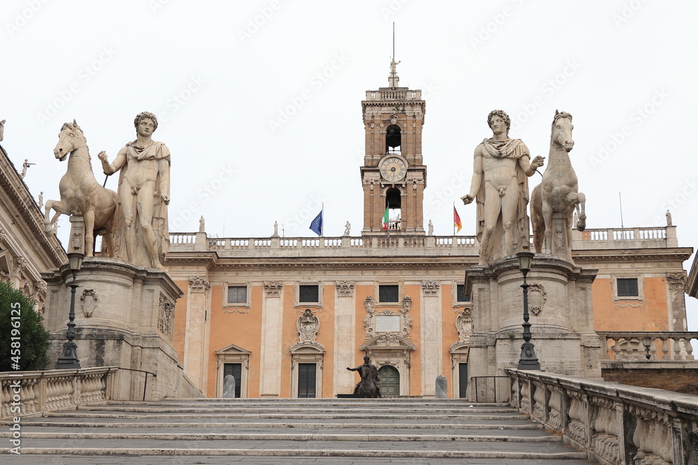 Campidoglio Square View with Stairs, Senatorial Palace Facade and Statues of Castor and Pollux with their Horses in Rome, Italy