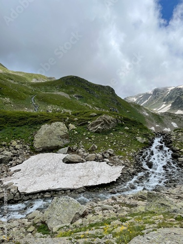 Green landscape with sky and mountains 