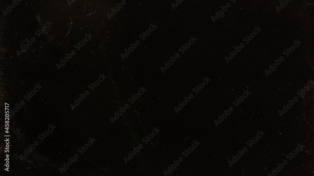 Background for an old movie with dust and noise on a black background
